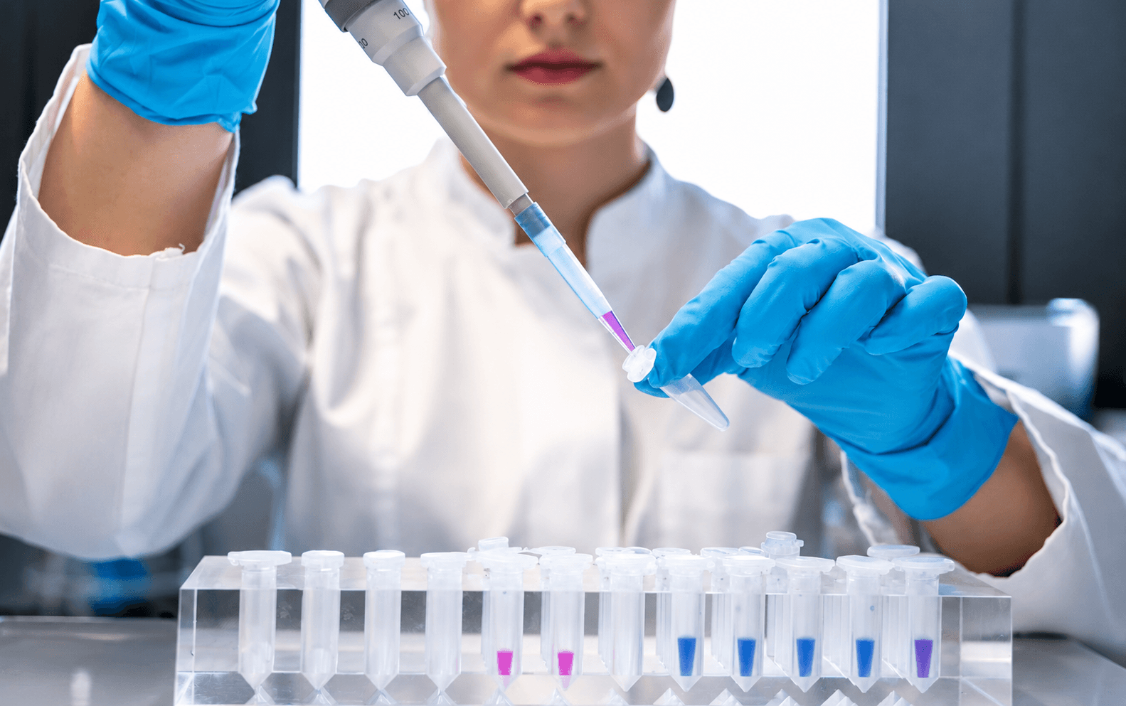 Lab technician testing water treatment chemistry